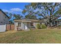 House exterior showcasing a well-maintained lawn at 4317 S Trask St, Tampa, FL 33611
