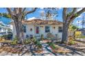 Charming single-story home with a well-maintained front yard and inviting walkway at 923 26Th N St, St Petersburg, FL 33713
