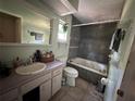 Bathroom with a shower and bathtub combo at 3133 Washington Rd, Valrico, FL 33594