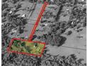 Aerial view of the property outlining the land and showing the house and long driveway entrance at 8922 Pritcher Rd, Lithia, FL 33547