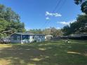 Home with spacious yard, offering a peaceful retreat in a desirable neighborhood at 37906 Tucker Rd, Zephyrhills, FL 33542