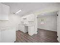 Bright kitchen with updated cabinets, countertops and new flooring at 6011 67Th N Ave, Pinellas Park, FL 33781