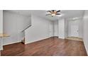 Living room featuring hardwood floors and an open concept design that brings in lots of light at 2622 Lantern Hill Ave, Brandon, FL 33511