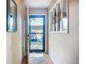 Bright entryway with tile flooring, leading into the home's interior, filled with natural light at 6012 28Th W St, Bradenton, FL 34207