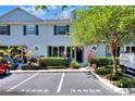 Well-maintained two-story townhouse with assigned parking spaces at 34852 Teeview Ln, Zephyrhills, FL 33541