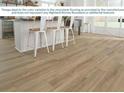 Image shows the color variation in the vinyl plank flooring as provided by the manufacturer at 35502 Coventry Fields Loop, Zephyrhills, FL 33541