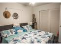 Comfortable bedroom features closet space and decorative coastal-themed accents at 7713 39Th N Ave, St Petersburg, FL 33709