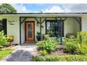 Inviting front porch with comfortable seating, decorative plants, and a welcoming entrance at 4616 Edwards Rd, Plant City, FL 33567