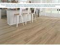Modern vinyl plank flooring providing style and durability to any space at 7084 162Nd E Pl, Parrish, FL 34219