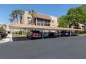 Covered parking area with ample spaces for residents at 1520 Glen Oaks E Dr # 353, Sarasota, FL 34232