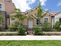 Cute house with a landscaped yard and a welcoming entrance at 930 E Venice Ave, Venice, FL 34285