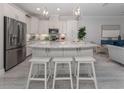 Modern kitchen with a large island and stainless steel appliances at 934 E Venice Ave, Venice, FL 34285