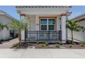 Front view of a charming villa with a landscaped yard at 117 Clifton Way, Venice, FL 34292