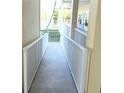 Accessible ramp leading to the building entrance at 101 Natures Way # 1104, Rotonda West, FL 33947