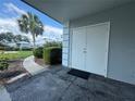 Double doors and stone walkway to the front entrance at 266 Cerromar S Way # 55, Venice, FL 34293
