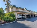 Covered parking area with ample spaces for residents at 601 Shreve St # 51B, Punta Gorda, FL 33950