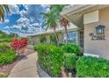Landscaped walkway leading to the front door of the house at 1567 Waterford Dr, Venice, FL 34292