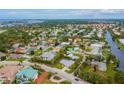 Wide shot of the property and surrounding neighborhood at 612 Albee W Rd, Nokomis, FL 34275