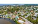Property located on the water, near other homes and waterways at 612 Albee W Rd, Nokomis, FL 34275