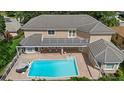 Aerial view of home showcasing pool and large backyard at 8188 Shadow Pine Way, Sarasota, FL 34238