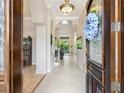 Elegant entryway with hardwood floors and high ceilings at 1040 Gulf Winds Way, Nokomis, FL 34275