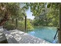 Private dock offering serene waterway access at 1895 Buccaneer Cir, Sarasota, FL 34231