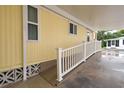 Exterior view of a ramp leading to the mobile home at 628 Cervina Dr, Venice, FL 34285