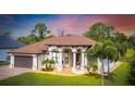 House exterior featuring Mediterranean-style architecture at 2197 Nita Ter, North Port, FL 34286