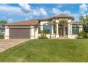 House exterior featuring Mediterranean-style architecture at 2197 Nita Ter, North Port, FL 34286