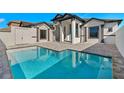 Inviting, rectangular pool in the backyard of a luxury home at 15060 Aquarius Cir, Port Charlotte, FL 33981