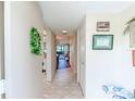 Bright and spacious condo entryway with tile flooring at 772 Bird Bay Way # 103, Venice, FL 34285