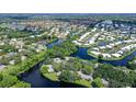 Property located in a waterfront community with lush landscaping at 338 Pembroke Dr # 208, Venice, FL 34293