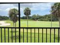 Stunning golf course view from screened balcony at 929 Capri Isles Blvd # 22, Venice, FL 34292