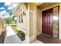 Entryway with view into living room and high ceilings at 122 Tiziano Way, North Venice, FL 34275