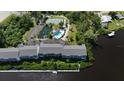 Community features pool, tennis courts, and water views at 1401 S Mccall Rd # 107B, Englewood, FL 34223