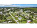 Aerial view showing the house and surrounding neighborhood at 8430 Truman St, Englewood, FL 34224