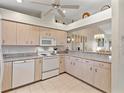 Well-equipped kitchen with granite countertops at 4260 Placida Rd # 13B, Englewood, FL 34224