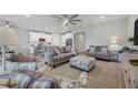 Open concept living room and kitchen area at 20318 Minuet Pl, Venice, FL 34293