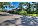 Assigned carport parking with additional guest parking nearby at 201 Woodland Dr # 201, Osprey, FL 34229