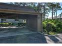 Covered carport parking space for residents at 201 Woodland Dr # 201, Osprey, FL 34229