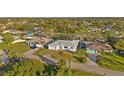 Aerial view showcasing the house's location within a residential area at 1247 Graham Rd, Venice, FL 34293