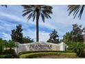 Islandwalk community entrance sign at The West Villages, featuring landscaping and palm trees at 13339 Pacchio St, Venice, FL 34293