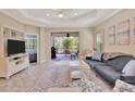 Spacious living area with access to the lanai at 1222 Collier Pl, Venice, FL 34293