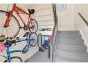 Stairwell with bikes stored on the wall at 1743 Lake Pl # 1743C, Venice, FL 34293