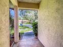 Covered entryway with view of the neighborhood at 2512 Regatta Dr, Sarasota, FL 34231
