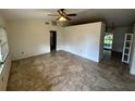 Living room with tile floors and a neutral color palette at 510 Madeira St, Port Charlotte, FL 33953