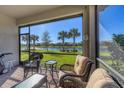 Relaxing screened patio overlooking a tranquil lake at 12633 Oriago St, Venice, FL 34293