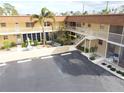 Aerial view of building and parking at 210 Park N Blvd # 129, Venice, FL 34285