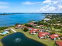 Exclusive community with waterfront access and lush landscaping at 784 Sarabay Rd # 18, Osprey, FL 34229