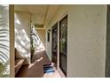 Condo entryway with bench and private entrance at 1174 Bird Bay Way # 107, Venice, FL 34285